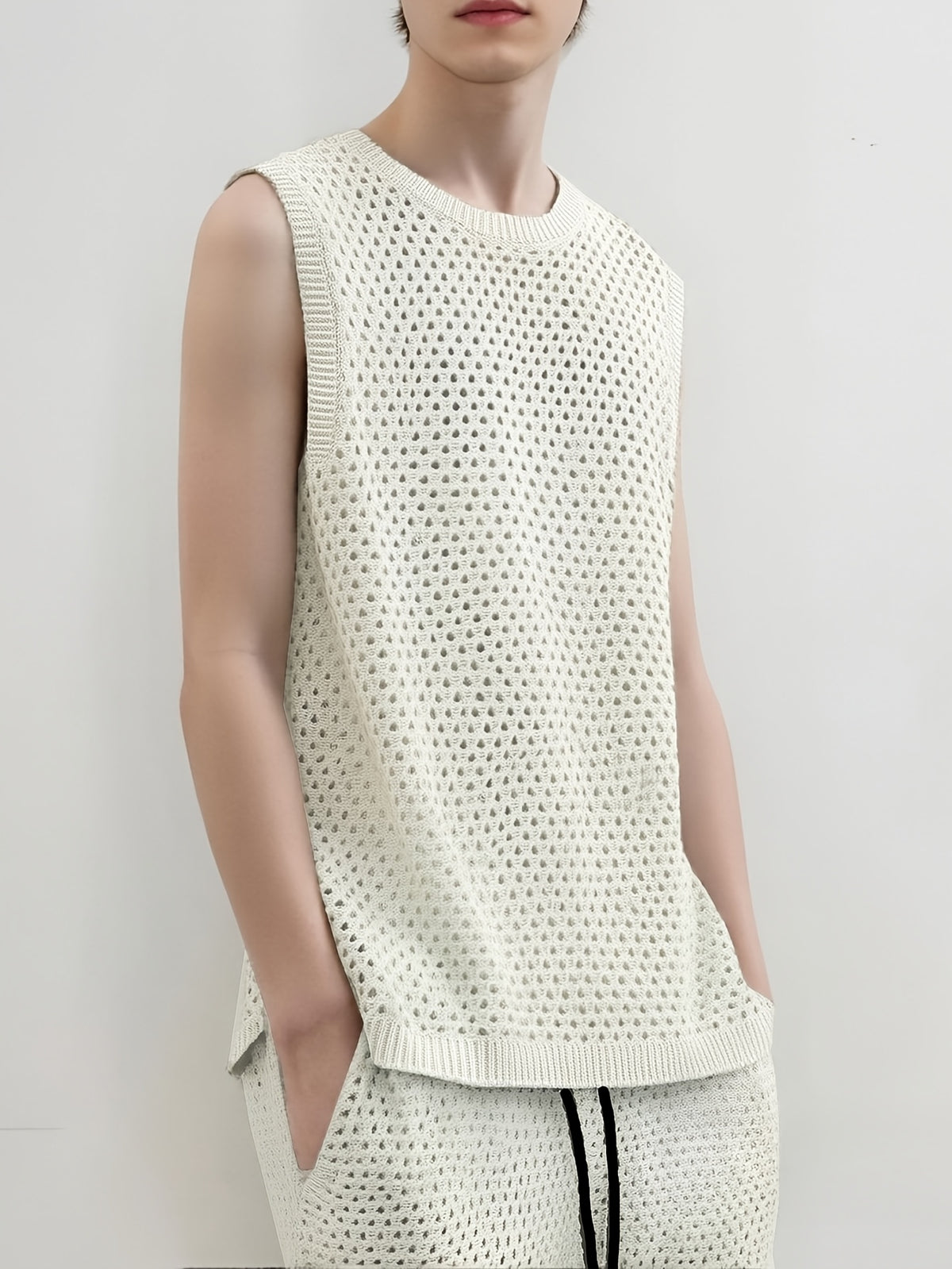 Men'S Casual Semi-Sheer Set, Featuring a Sleeveless Top And Shorts Made from Crochet. The Hollow Crochet Technique Gives a Easy And Relaxed Vibe to The Sleeveless Top, While The Shorts Come with a Drawstring Design